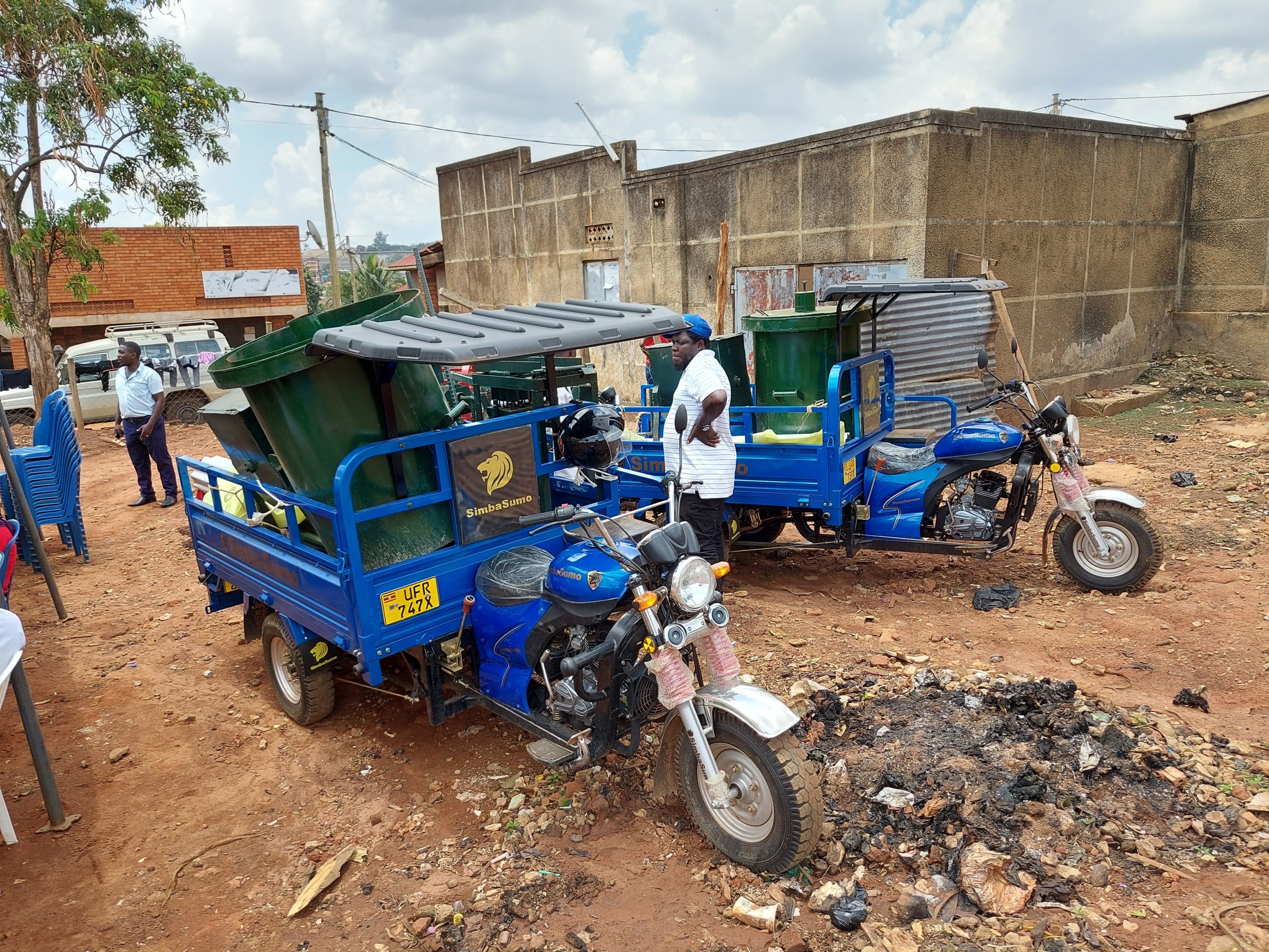 The picture shows briquette making machines and tricycles for garbage collection and briquette making which are ready to be handed over to the women groups in Kibuli.